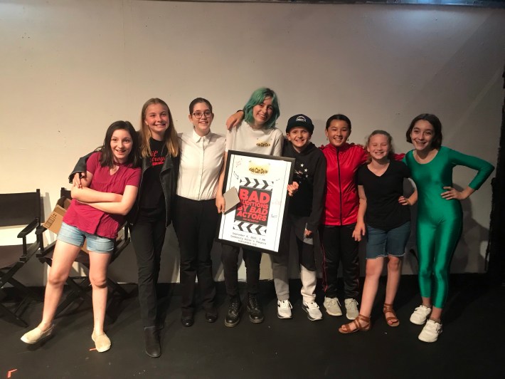 Actors pose for a cast photo